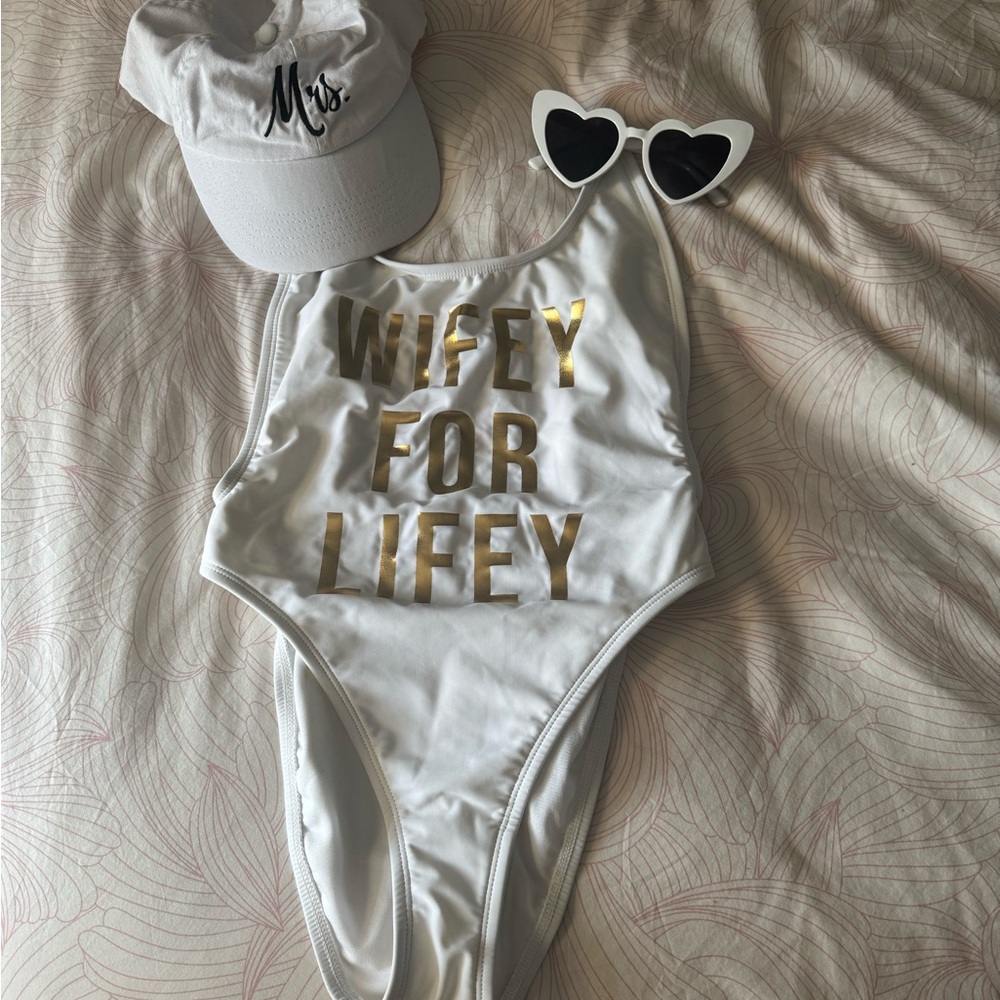 White and Gold 'Wifey for Lifey' One Piece Swimsuit with hat and sunglasses